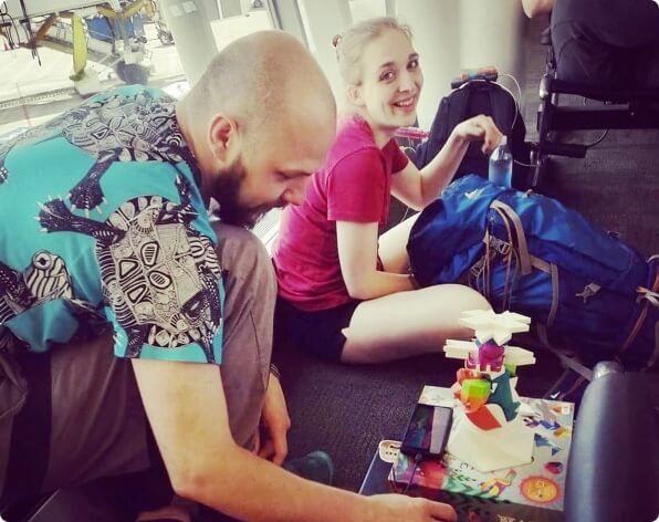 plinth and tower with smiling players